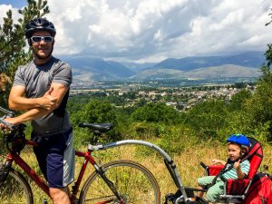 man riding bike in mountains