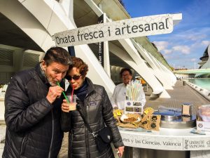 Couple shares a horchata at the City of Arts and Sciences in Valencia